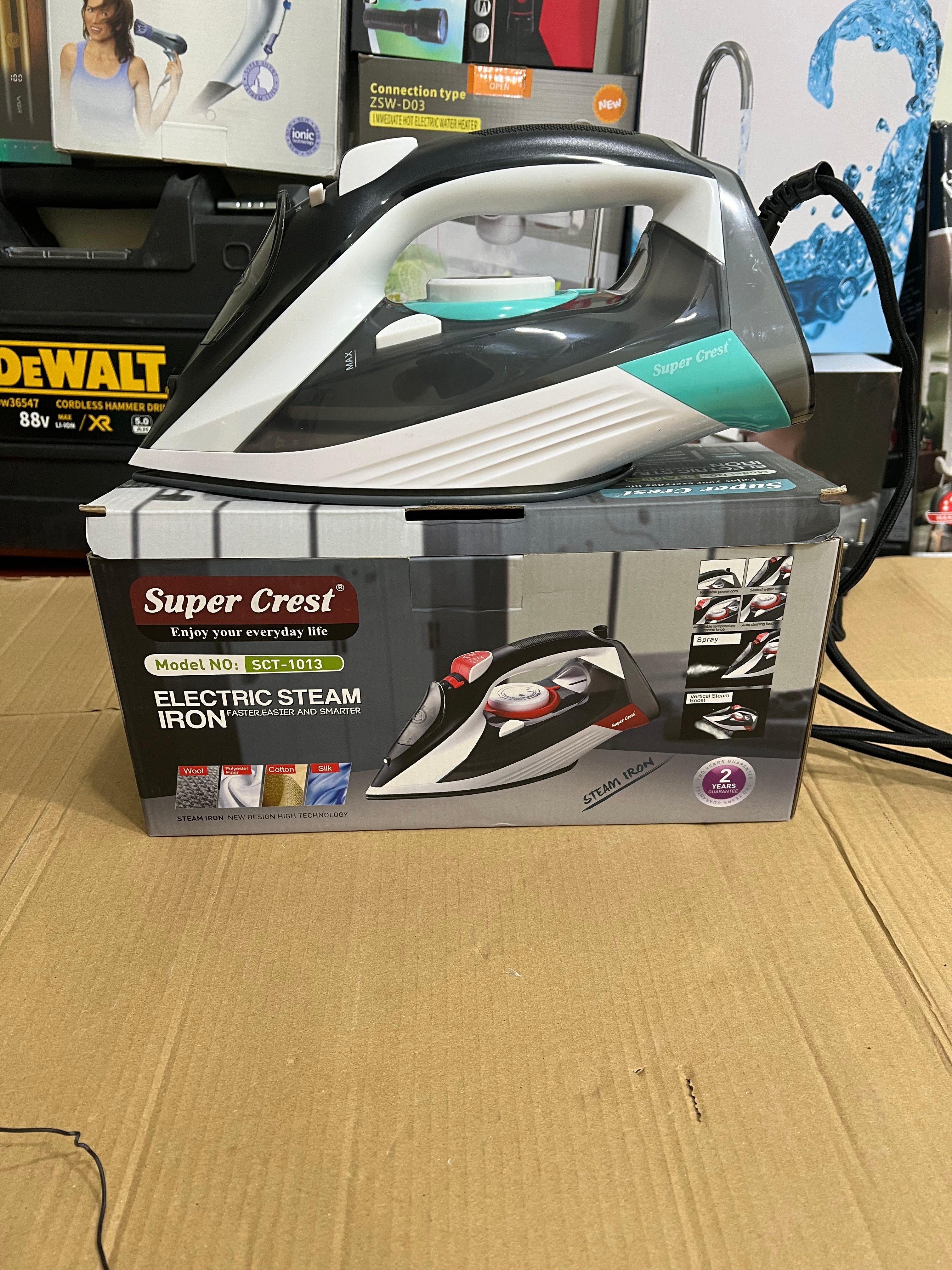 Lot imported super crest steam iron