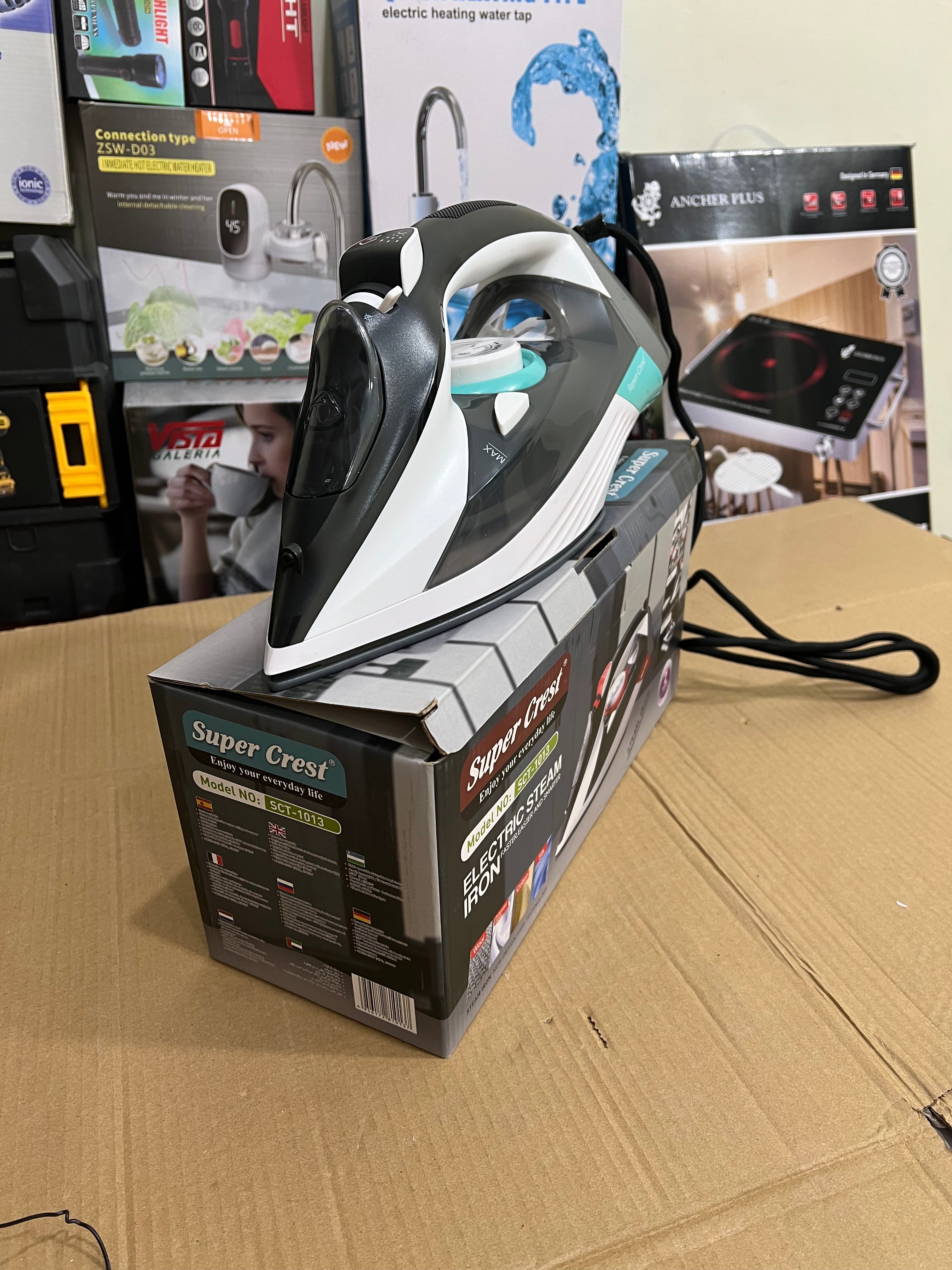 Lot imported super crest steam iron